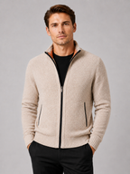 Man styling beige fleece cardigan sweater in a refined everyday winter lifestyle outfit