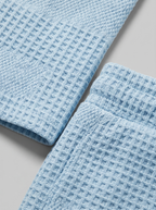 Set aus strukturiertem Polohemd und Shorts für Herren