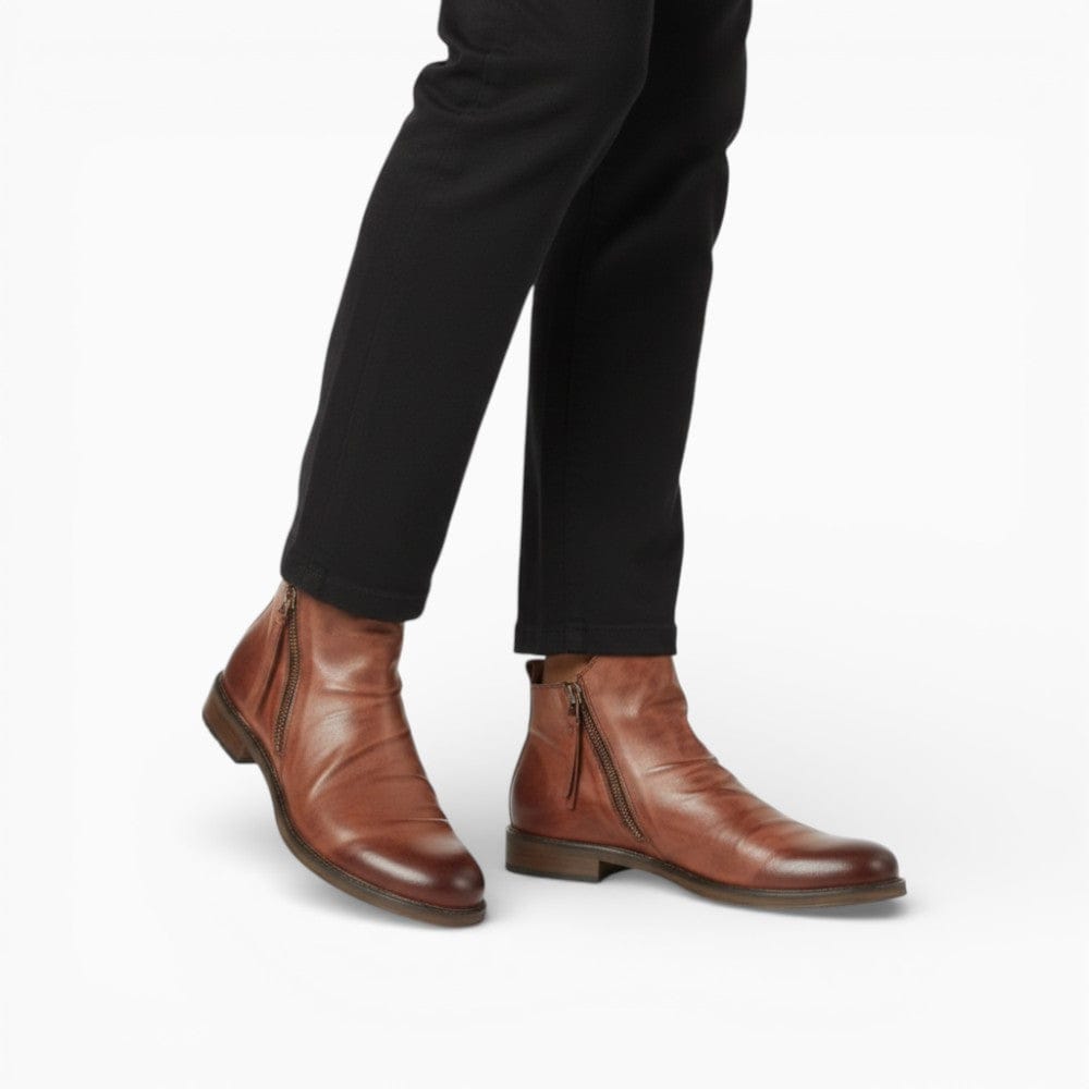 Bottes Chelsea pour hommes avec design punk à pompons