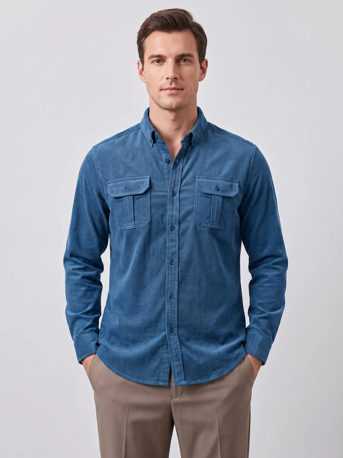 Rear studio view of a model wearing a Gray Twill Tweed Shirt, showing the back yoke, long sleeves, and curved hem.