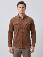 Front studio view of a model wearing a Navy Twill Tweed Shirt with a button-down collar and two button-flap chest pockets.